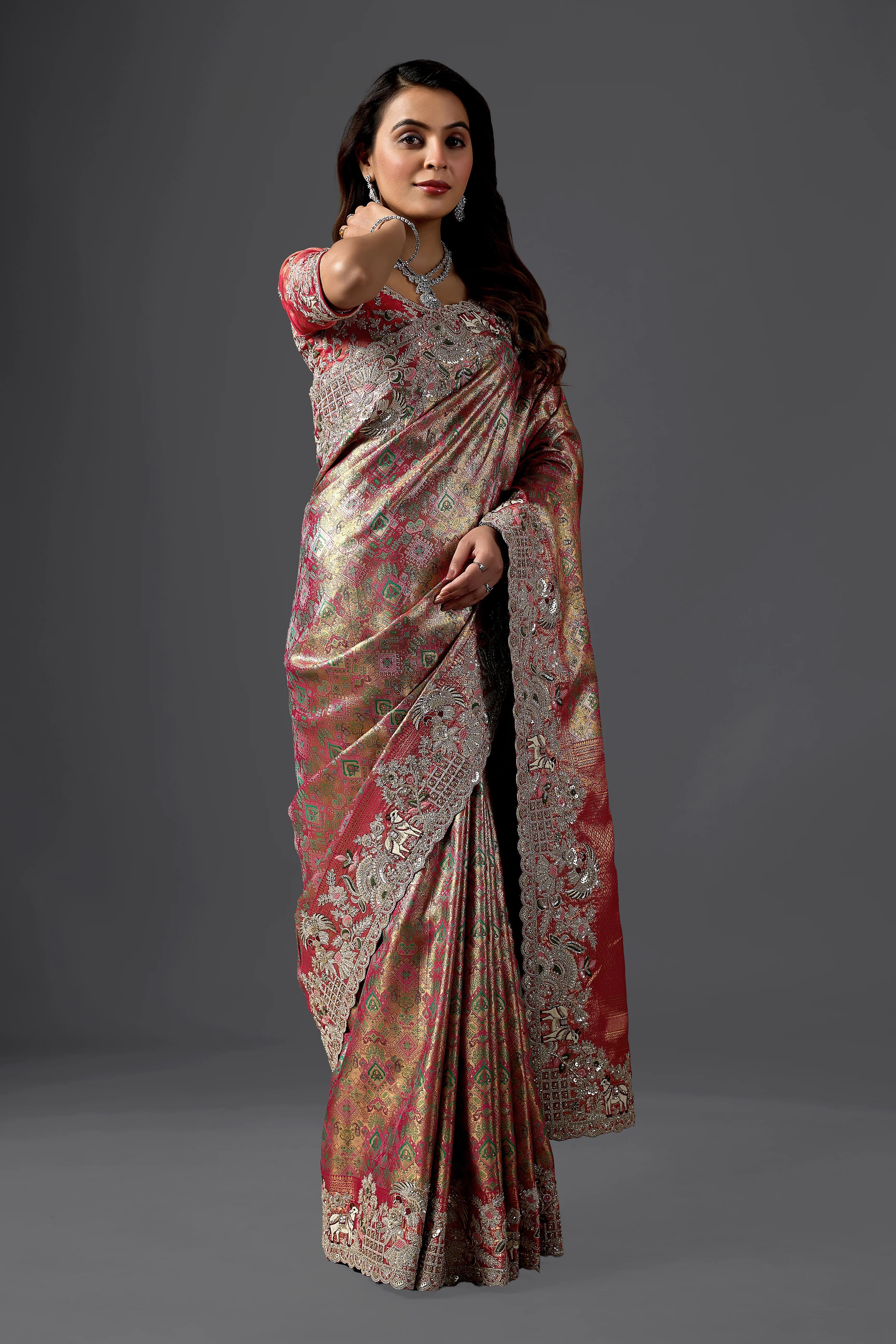 Rani Pink Jacquard Silk Saree with Heavy Handcrafted Border