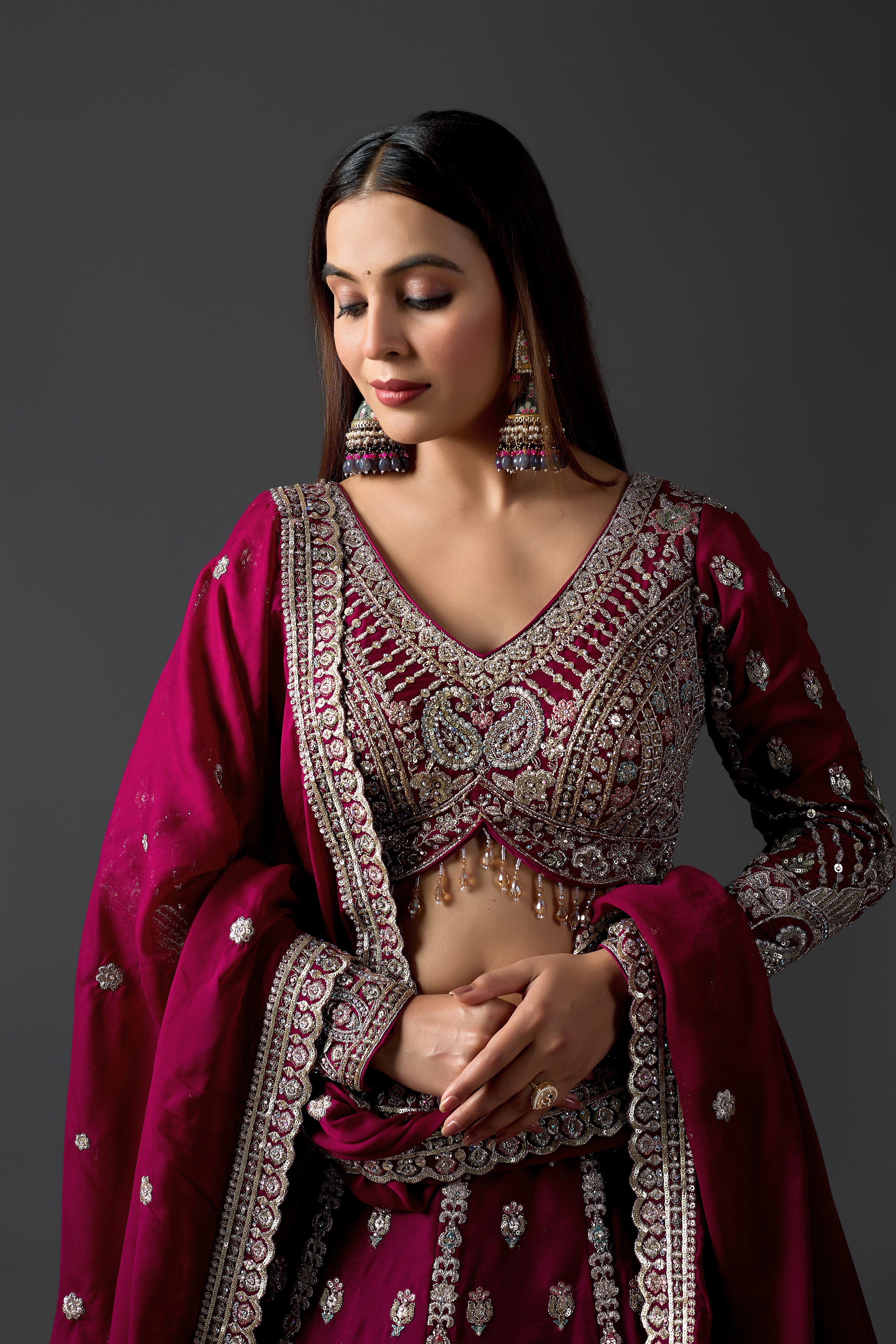 Ruby Wine Georgette Lehenga Set With Ornate Zari Border & Handcrafted Blouse
