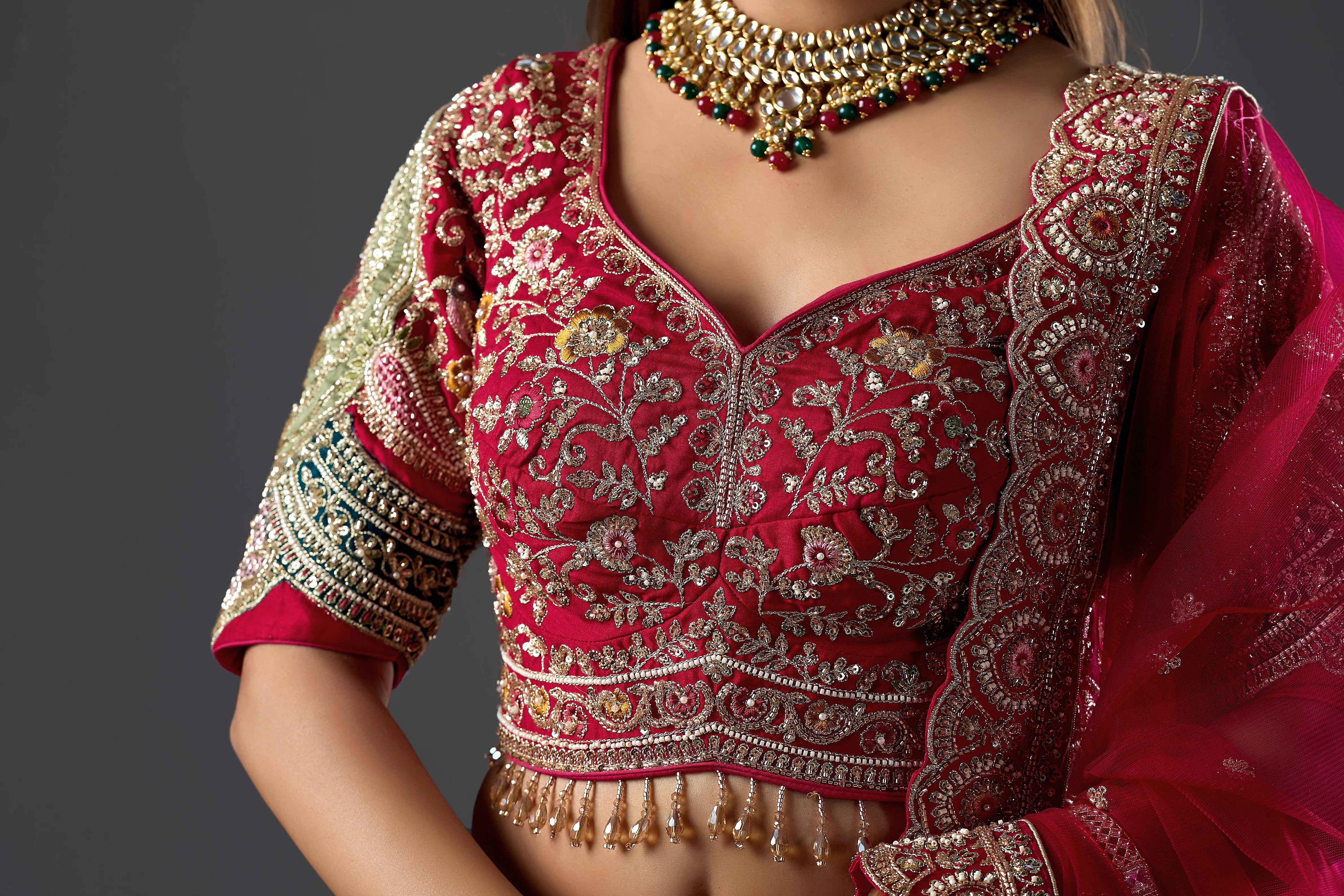 Maroon Raw Silk Hand & Machine Embroidered Bridal Lehenga Set