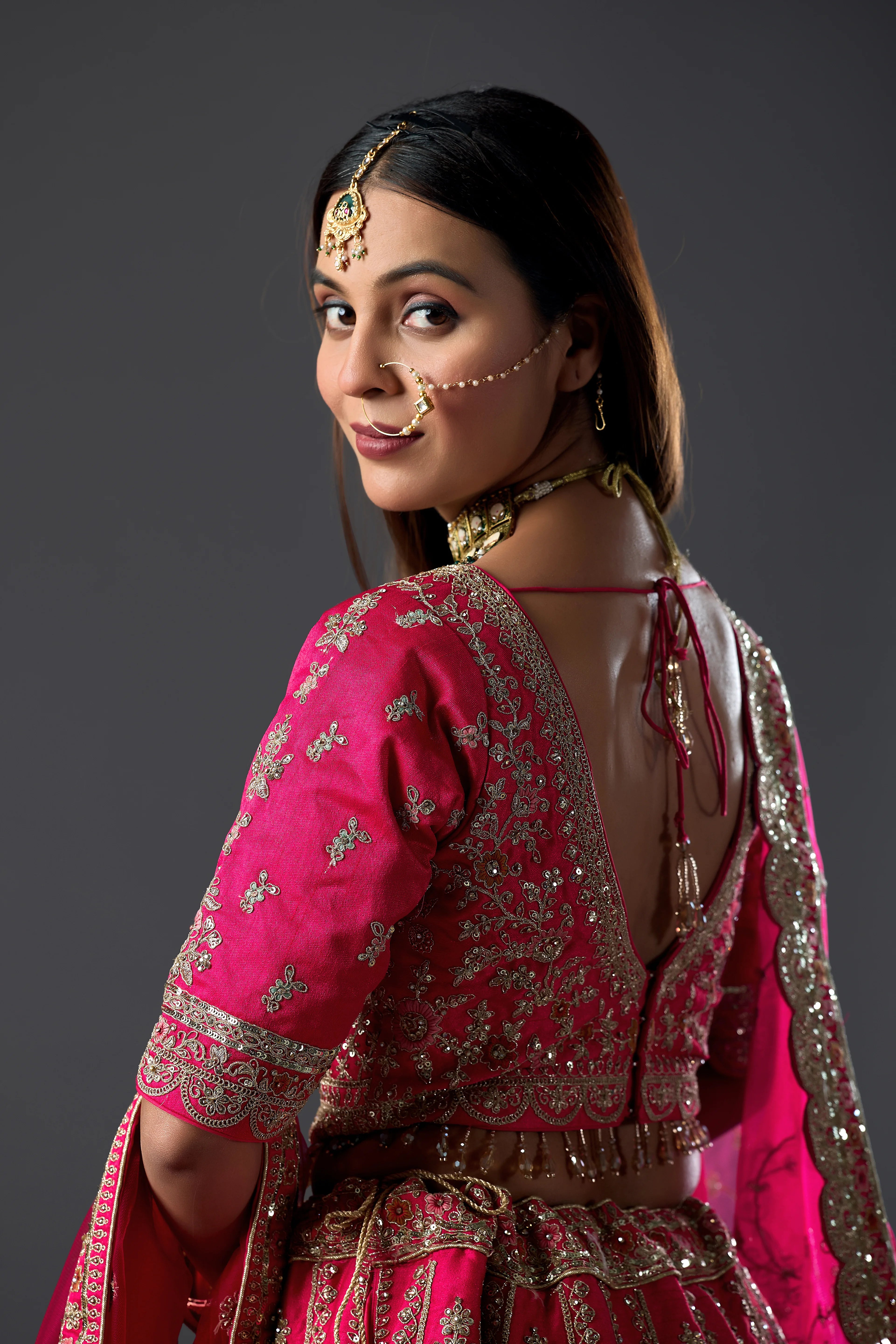 Rani Pink Bridal Lehenga With Gold Zari And Rich Embroidery