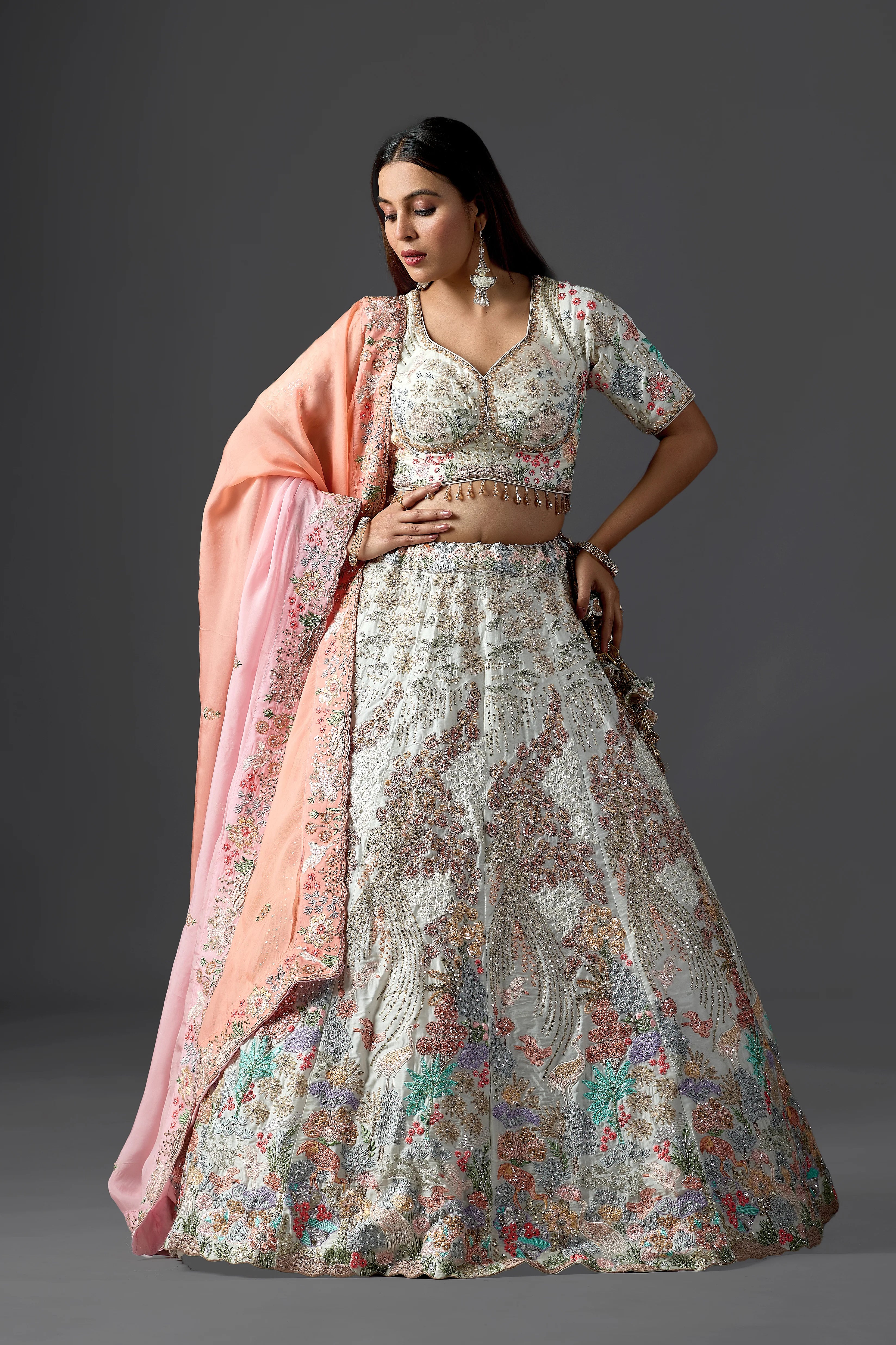 Ivory Raw Silk Applique Lehenga Choli with Multi-Color Threadwork & Sequins
