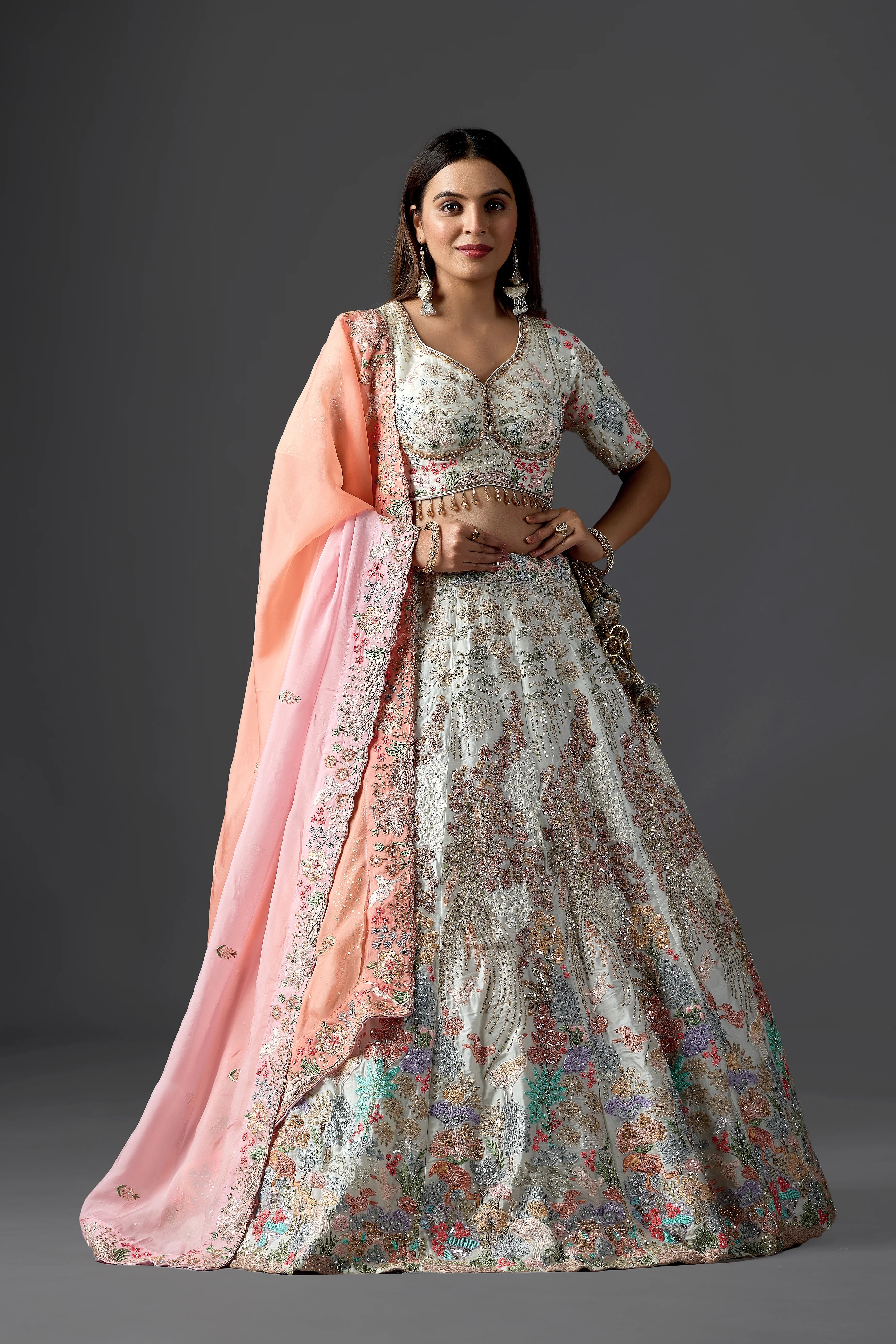 Ivory Raw Silk Applique Lehenga Choli with Multi-Color Threadwork & Sequins