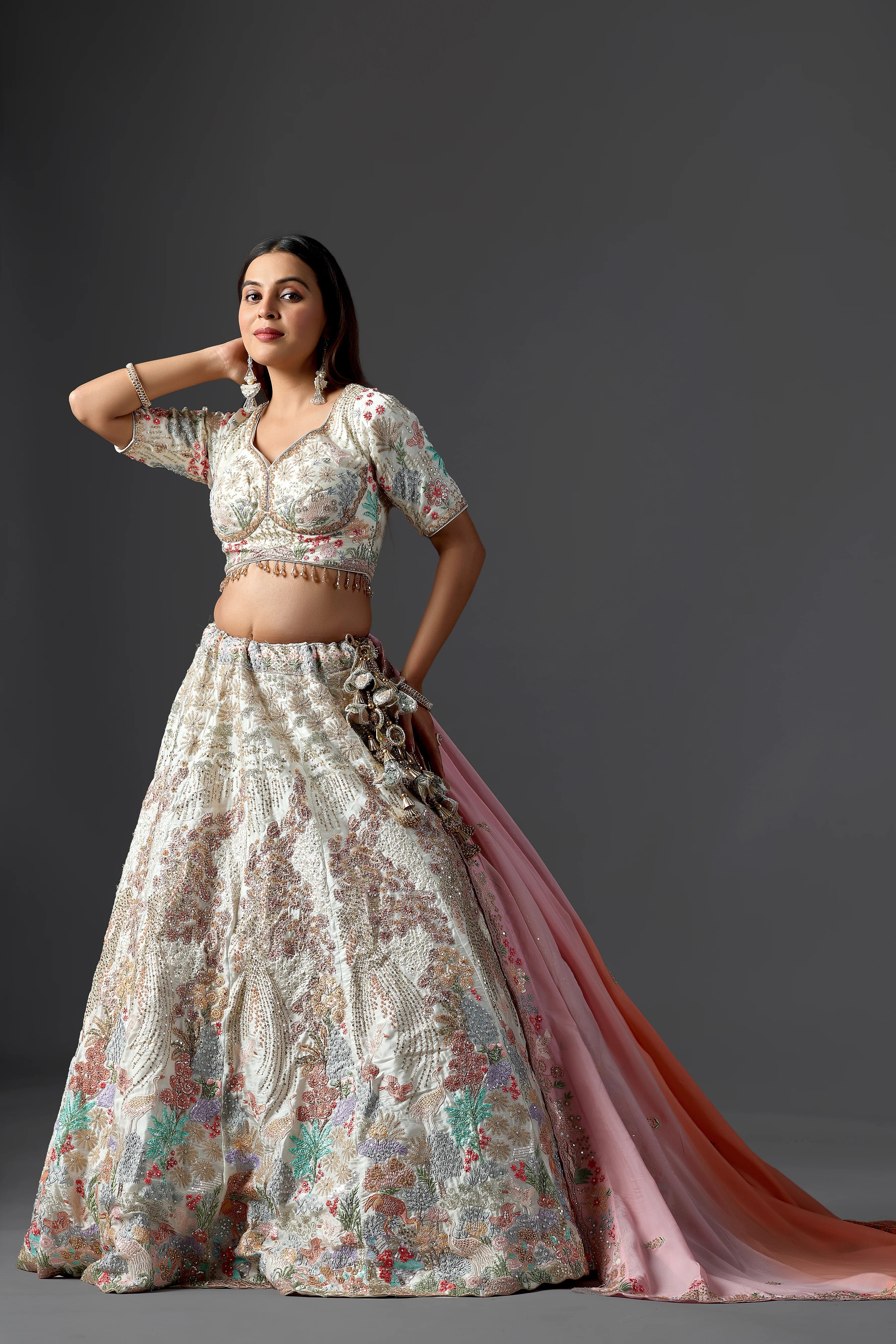 Ivory Raw Silk Applique Lehenga Choli with Multi-Color Threadwork & Sequins