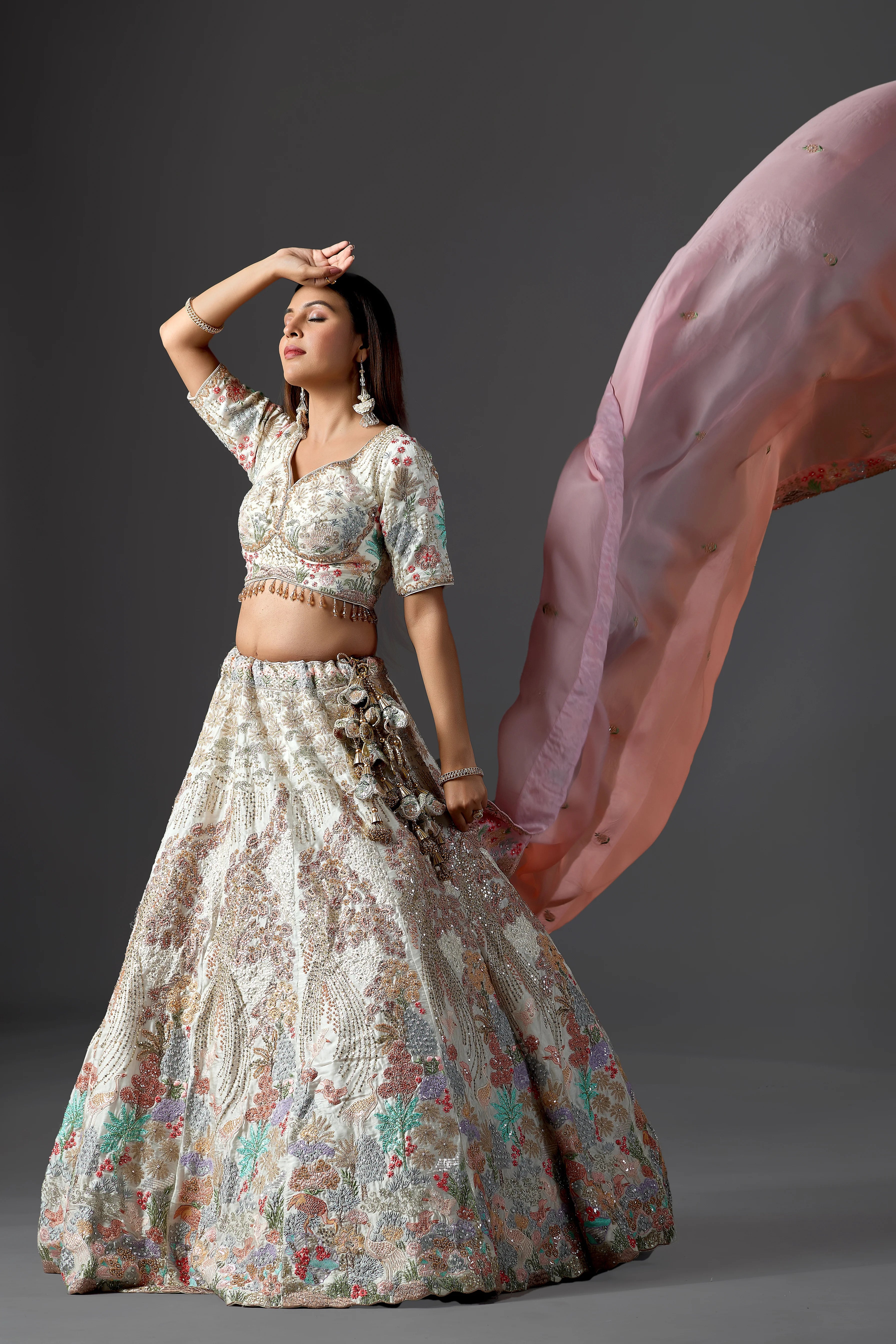 Ivory Raw Silk Applique Lehenga Choli with Multi-Color Threadwork & Sequins
