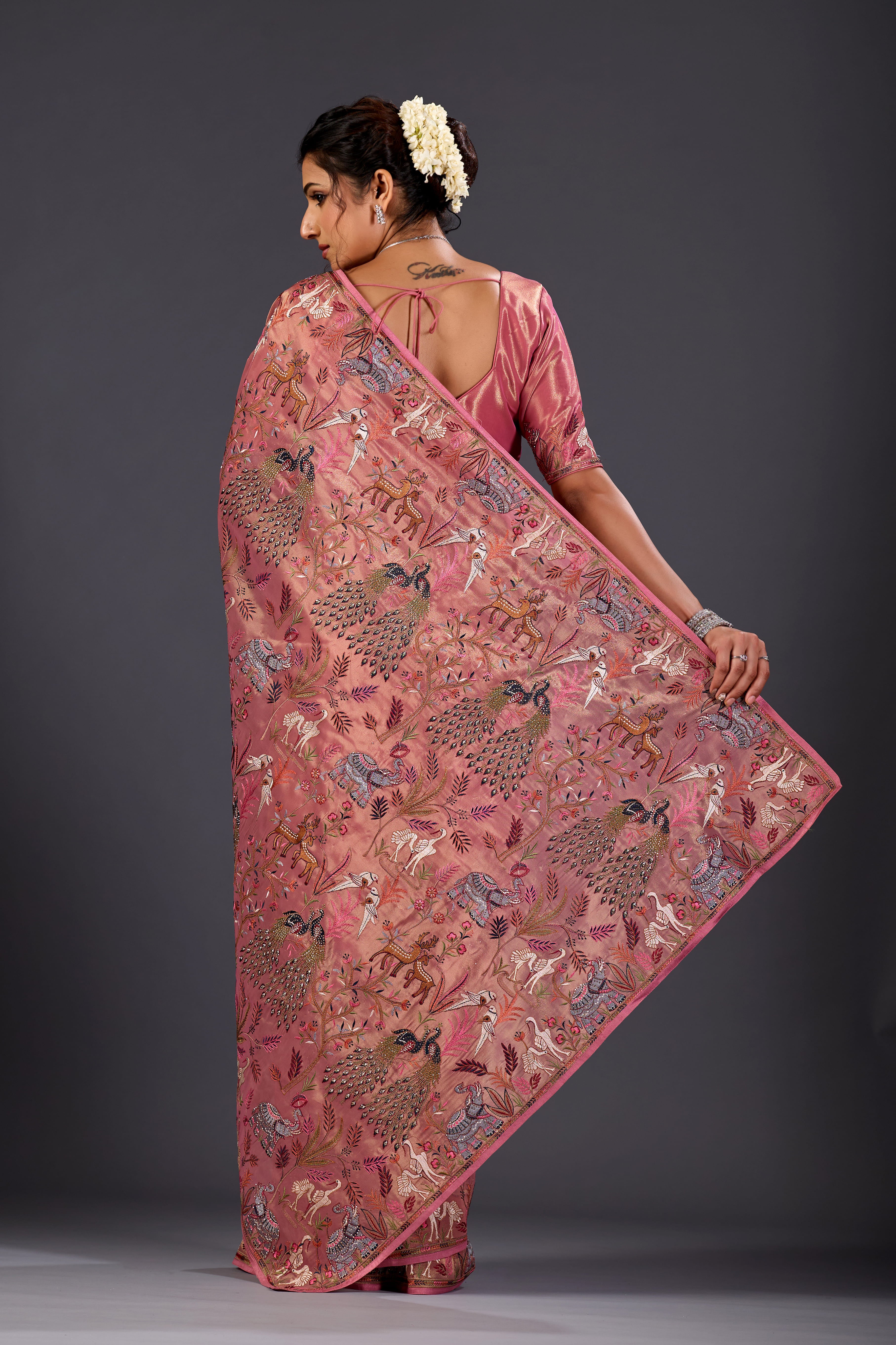 Dusky Rose  Giraffe Woven Saree With Nature Motif Embrodiery