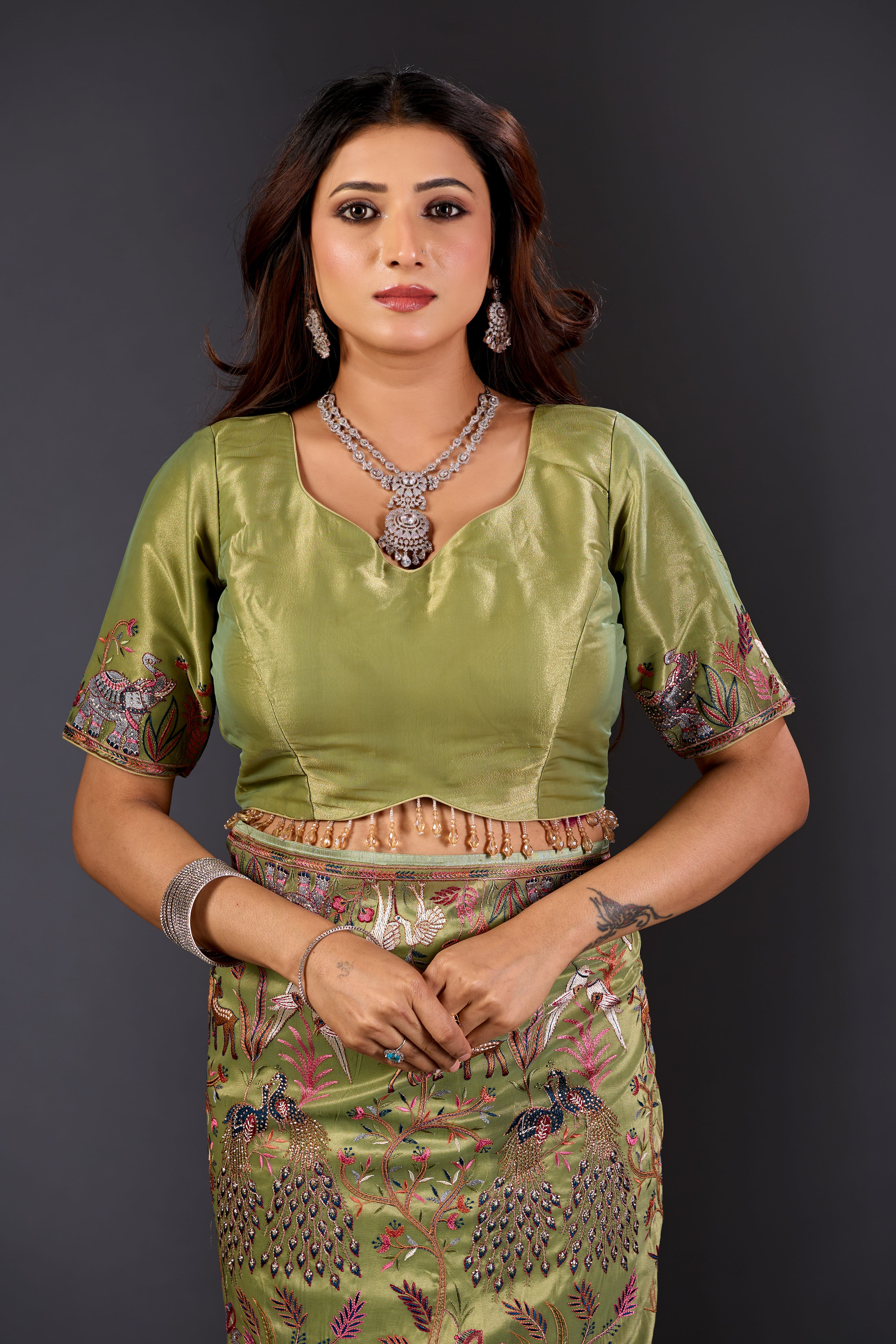 Mehandi Green  Giraffe Woven Saree With Nature Motif Embrodiery