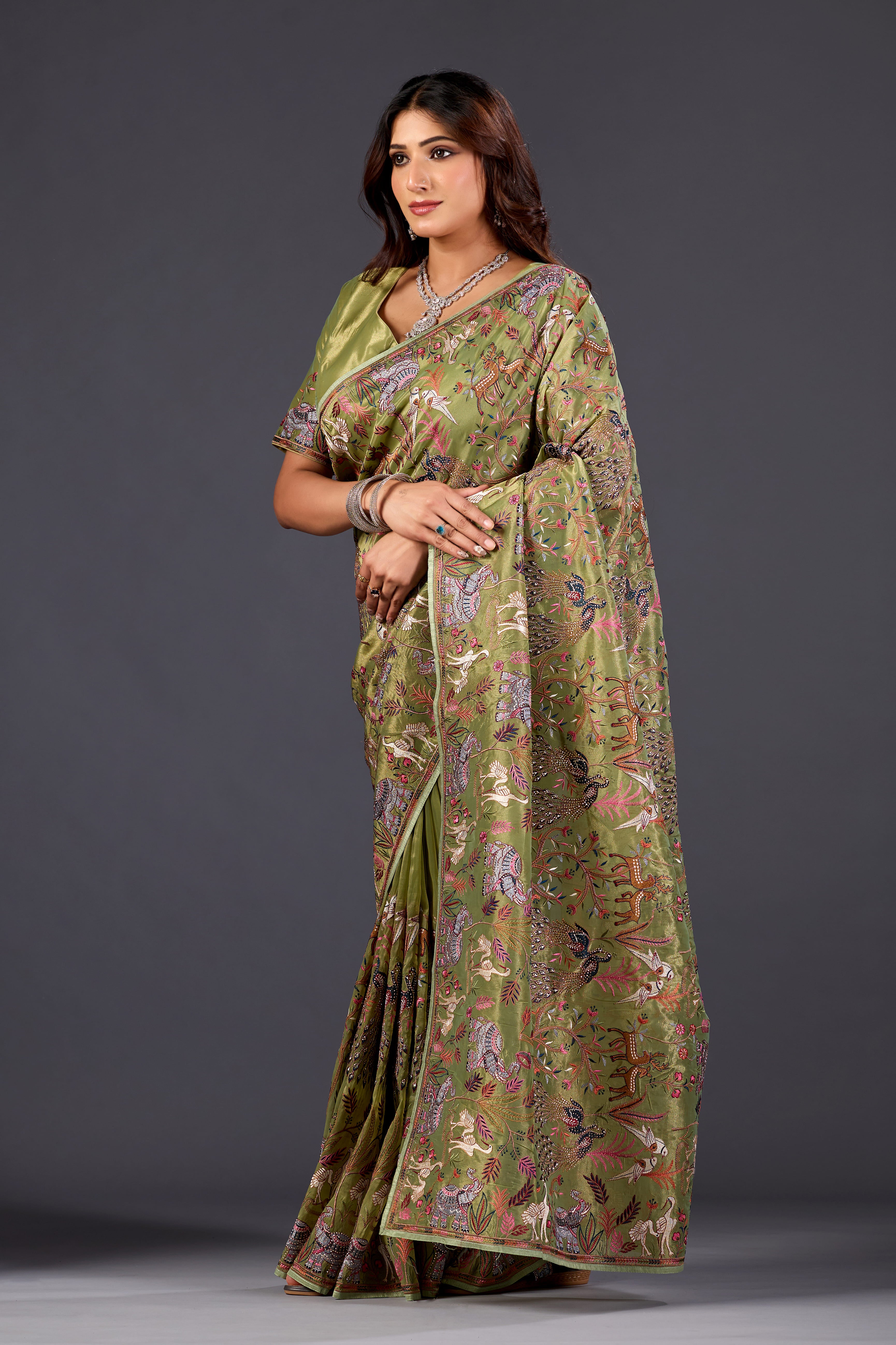 Mehandi Green  Giraffe Woven Saree With Nature Motif Embrodiery