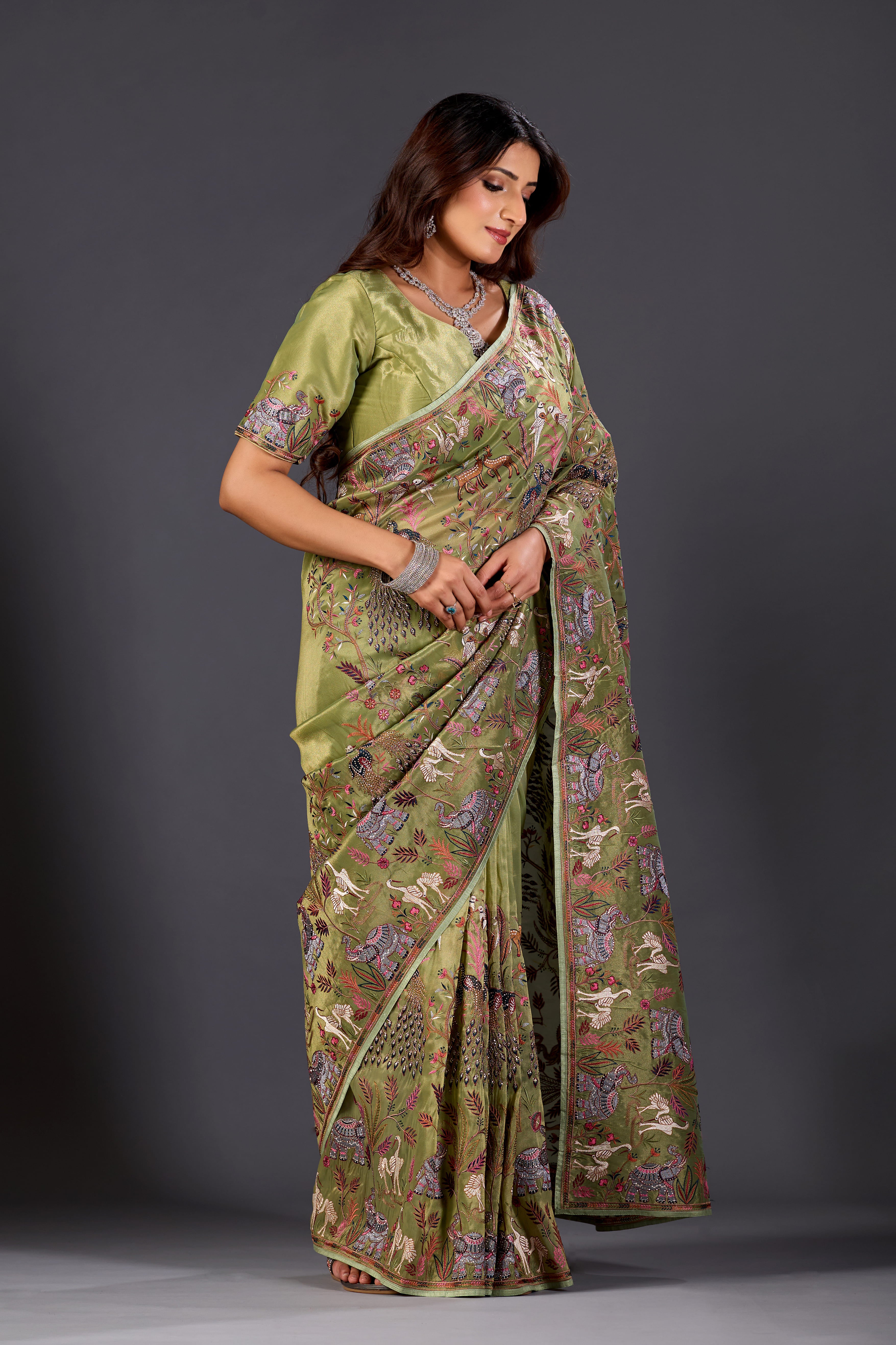 Mehandi Green  Giraffe Woven Saree With Nature Motif Embrodiery