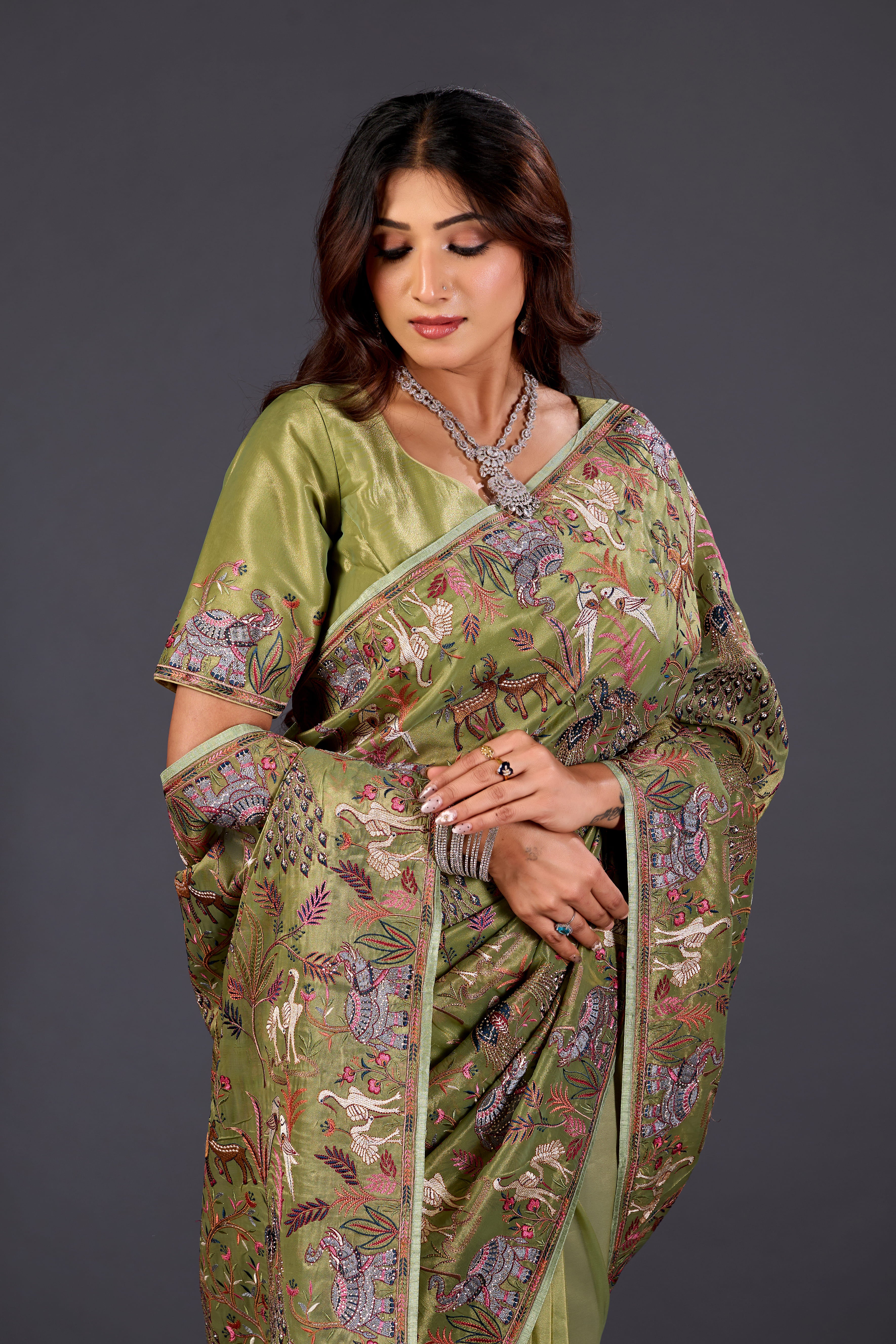 Mehandi Green  Giraffe Woven Saree With Nature Motif Embrodiery