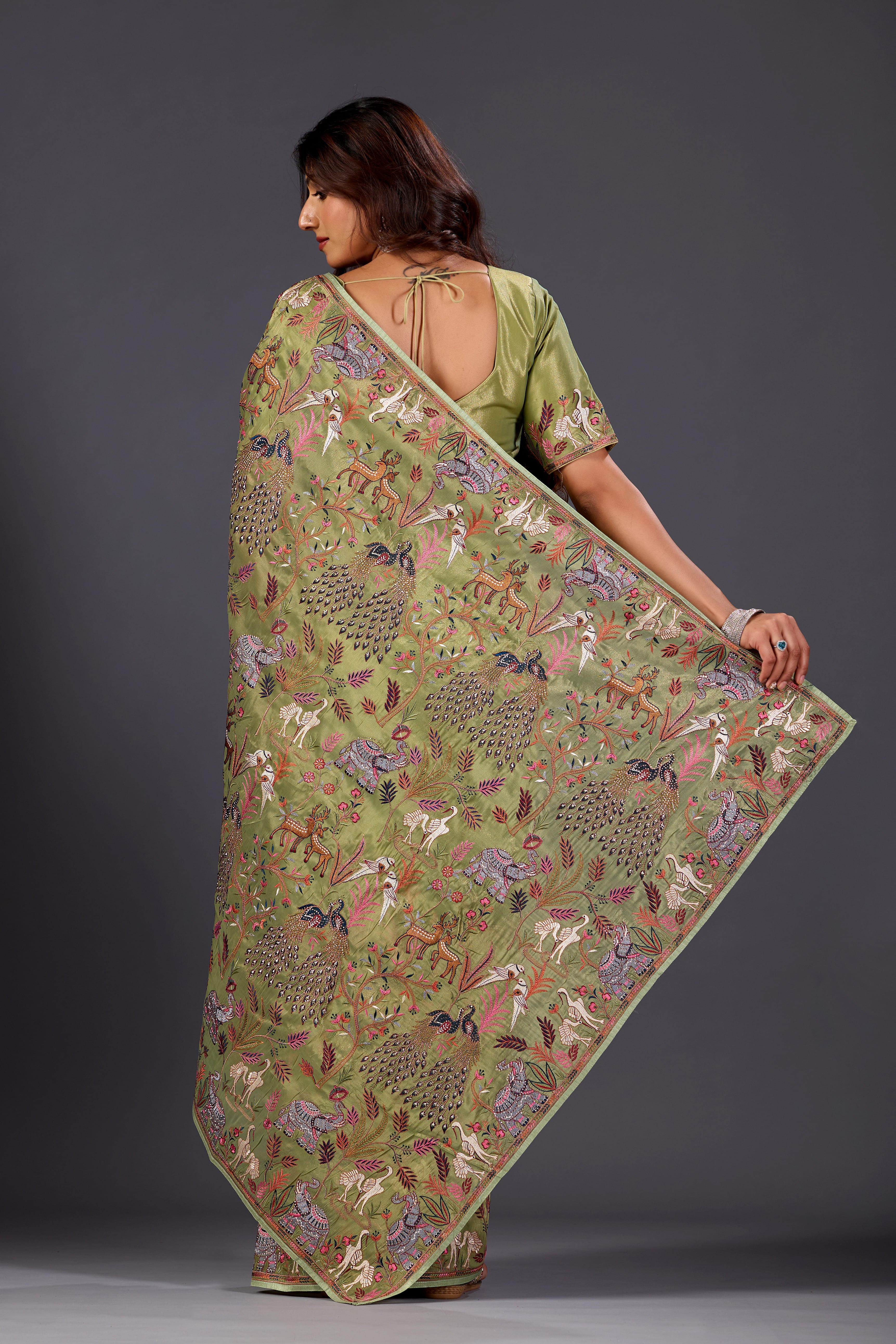 Mehandi Green  Giraffe Woven Saree With Nature Motif Embrodiery