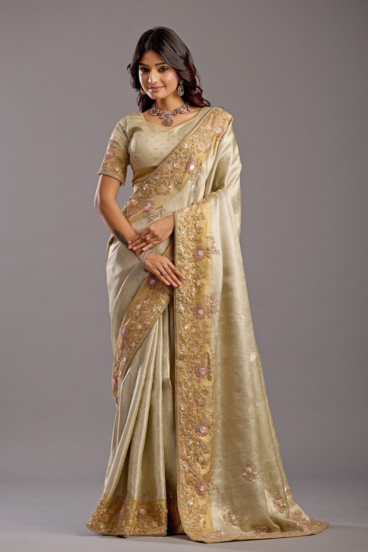 Elegant Vanilla Cream Tissue Silk Saree with Embellished Floral Border