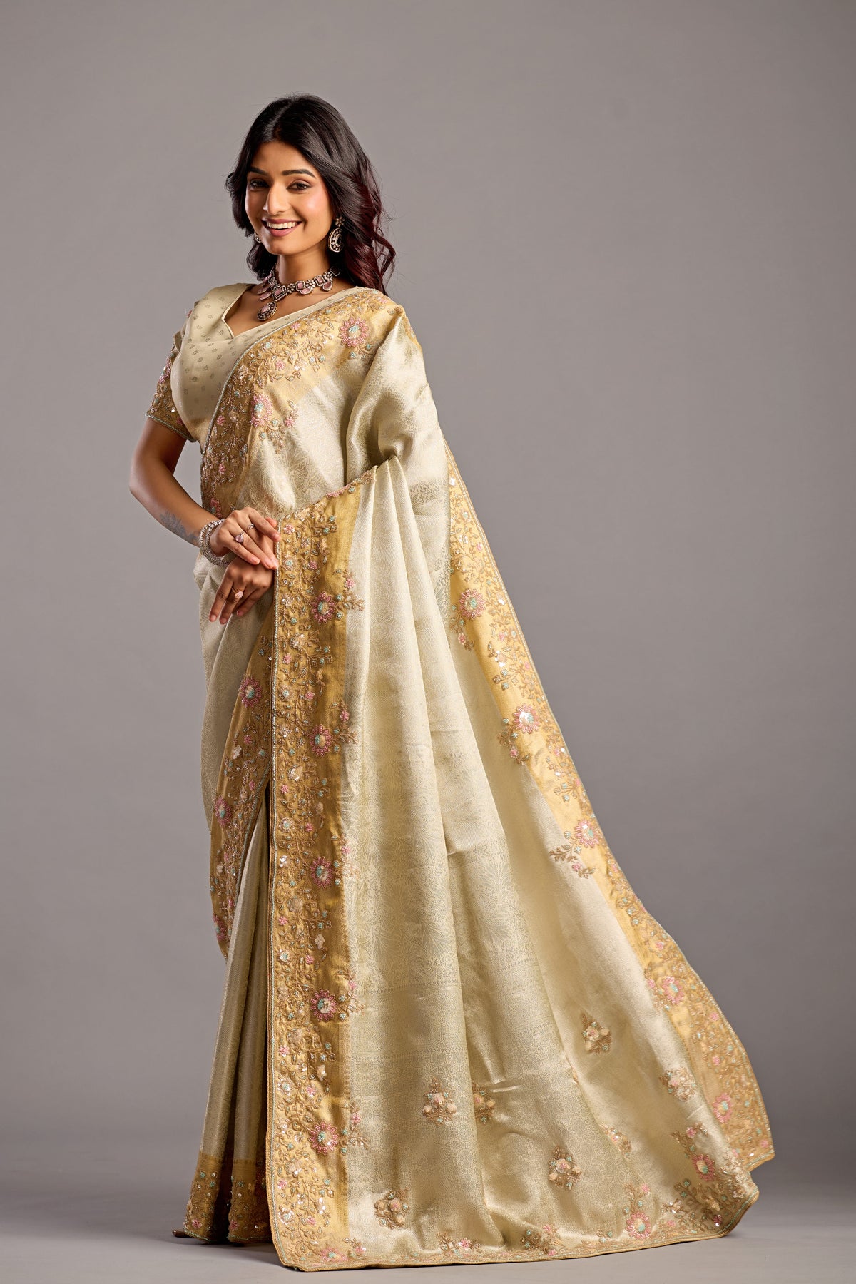 Elegant Vanilla Cream Tissue Silk Saree with Embellished Floral Border