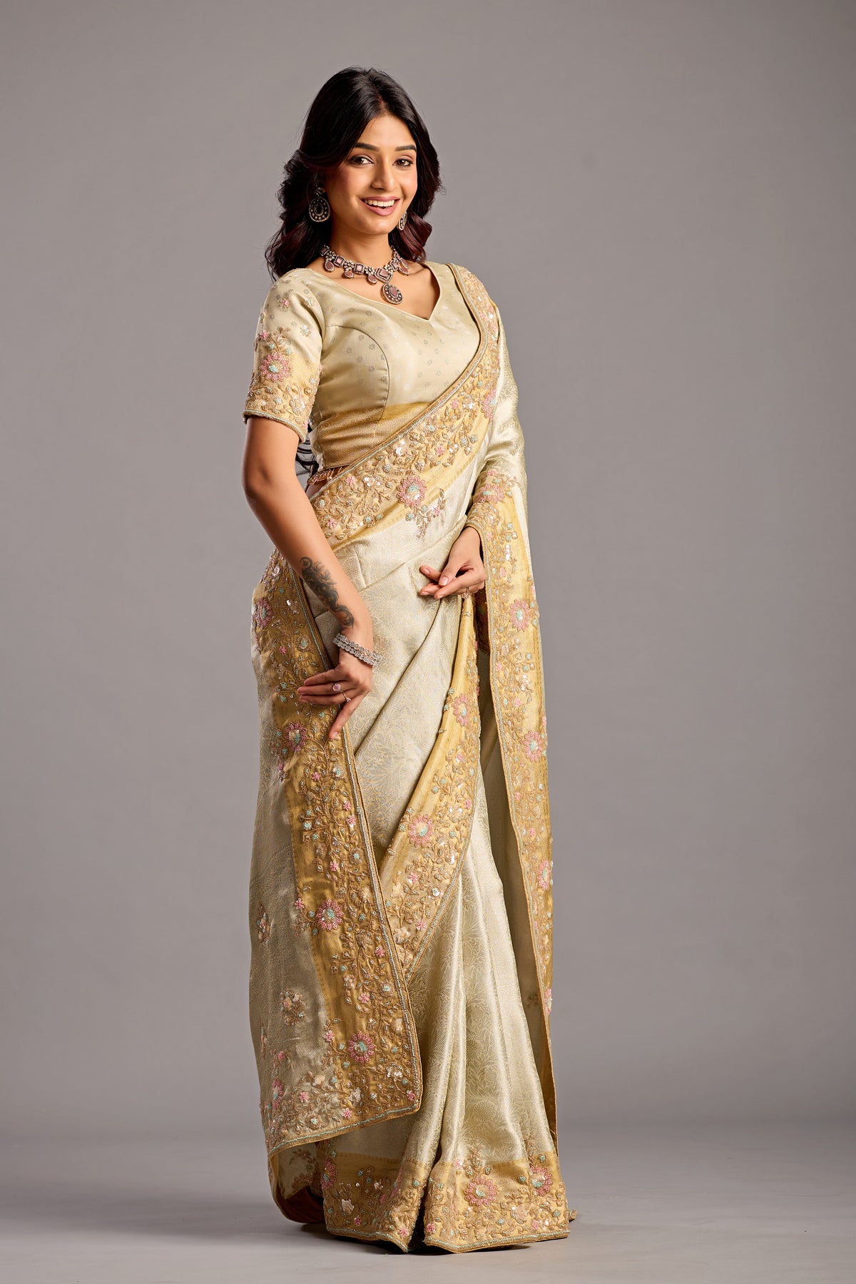 Elegant Vanilla Cream Tissue Silk Saree with Embellished Floral Border