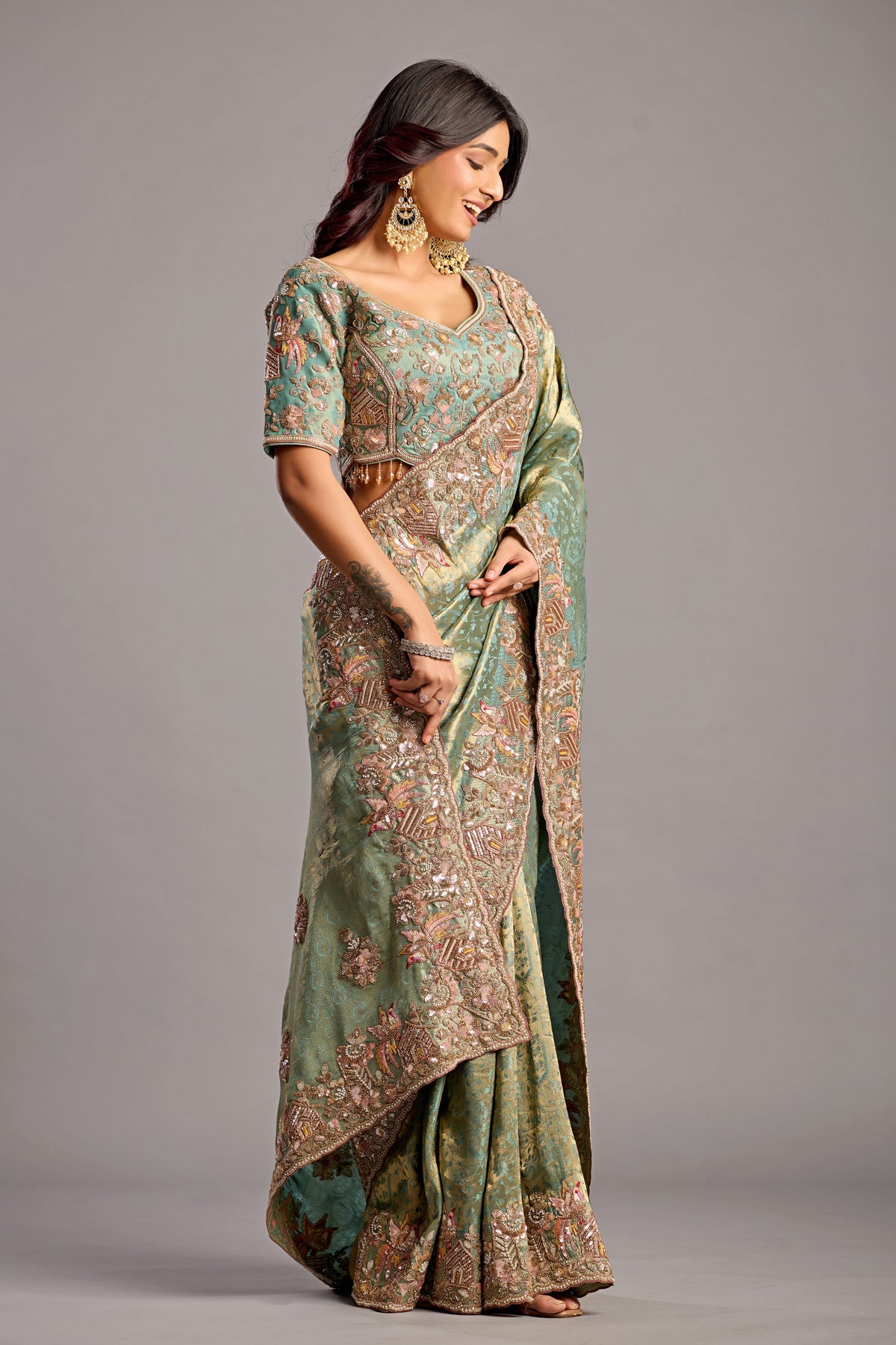 Sea Green Saree with Intricate Floral Embroidery & Embellished Border