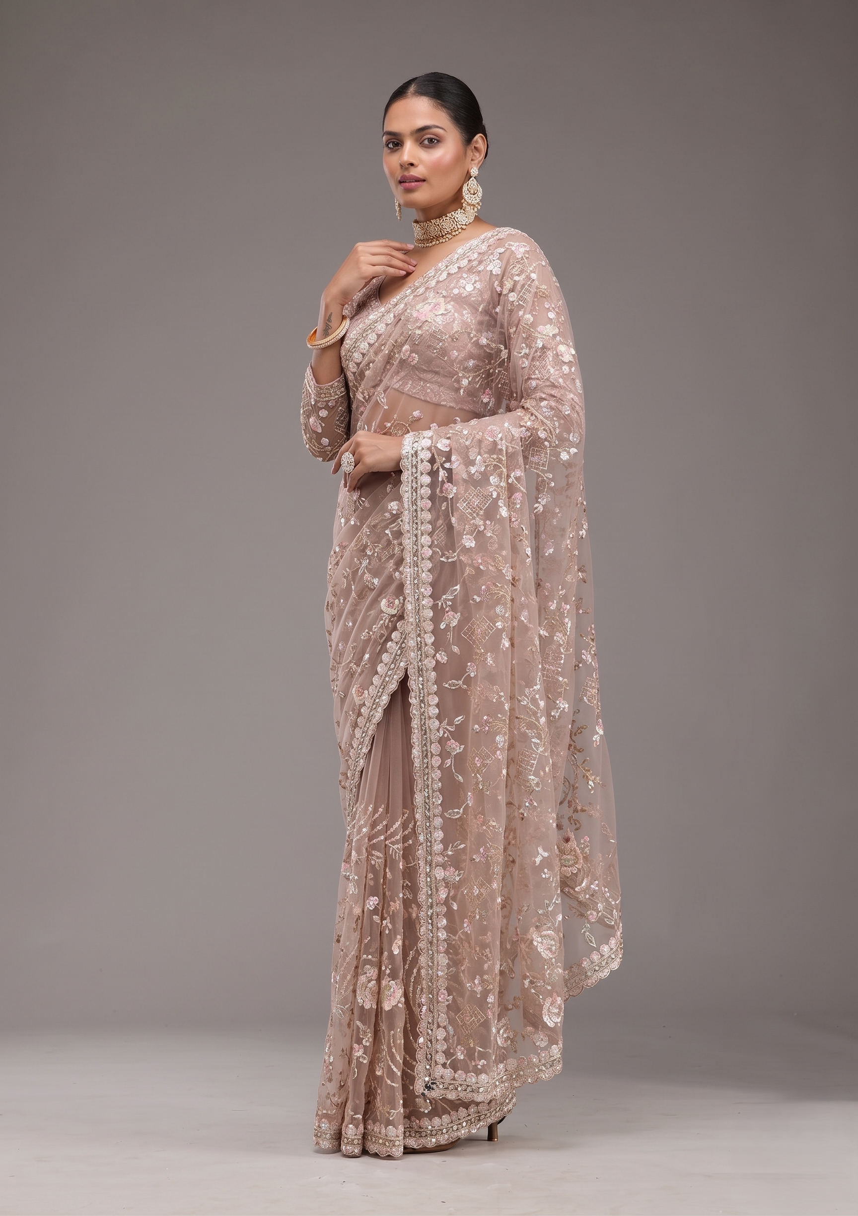 Beige Embroidered Net Saree with Floral Sequin Work and Designer Border