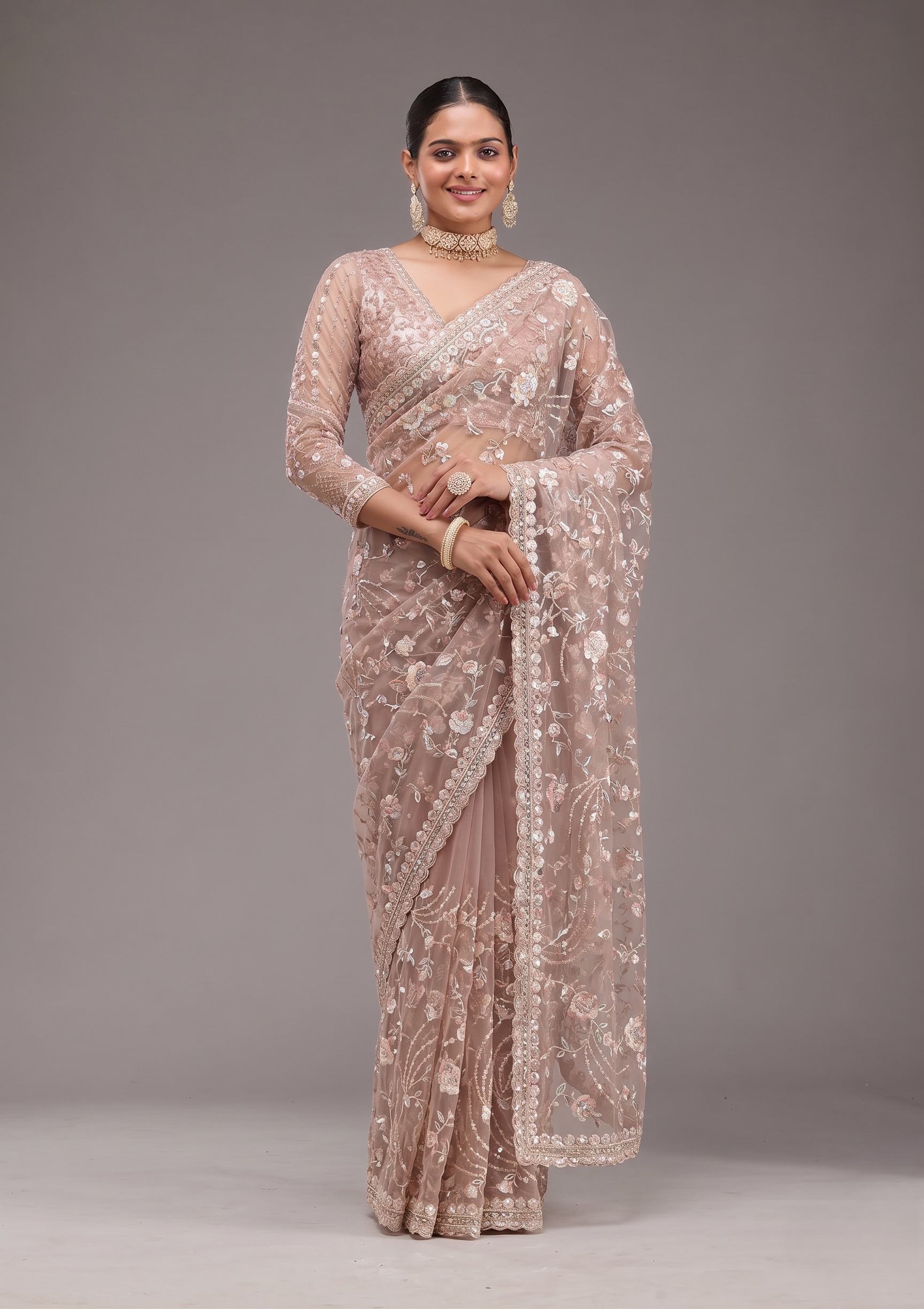 Beige Embroidered Net Saree with Floral Sequin Work and Designer Border