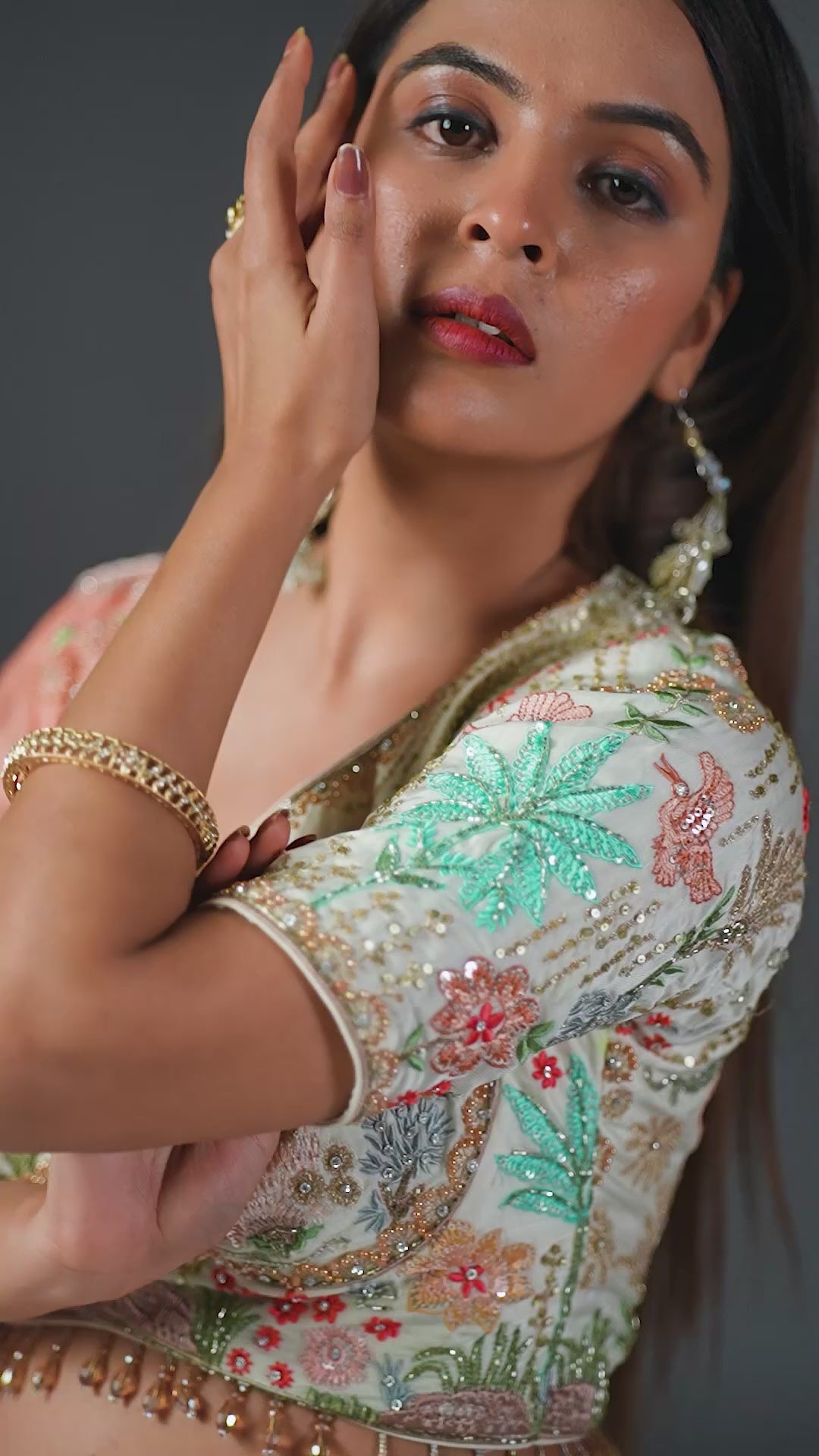 Ivory Raw Silk Applique Lehenga Choli with Multi-Color Threadwork & Sequins